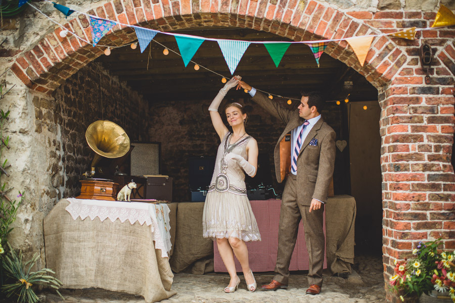 gramophone, a bride and groom dancing on their wedding day with bunting