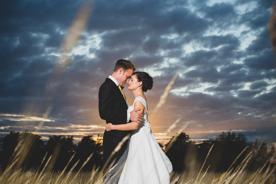 norfolk wedding photographer dramatic sky in corn field best
