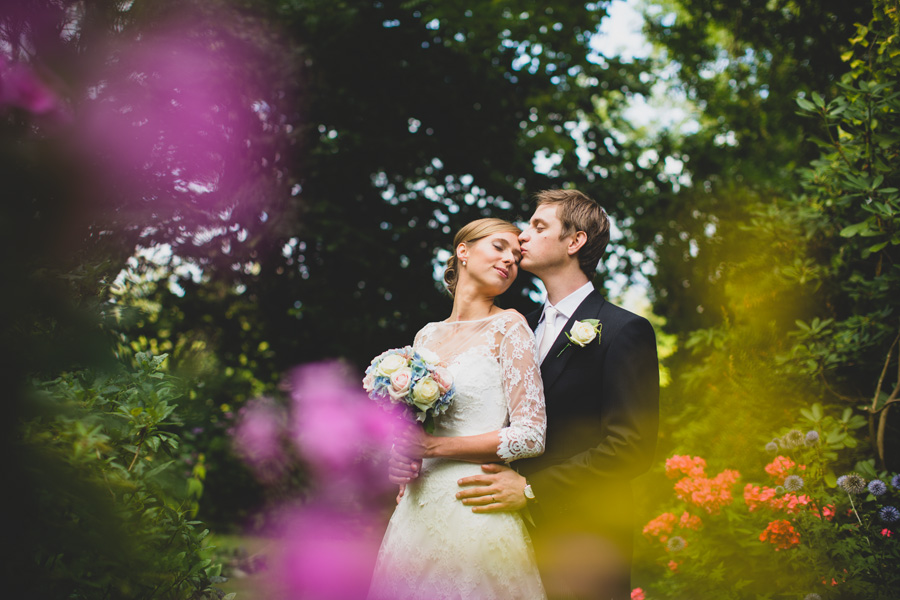 sevenoaks wedding photographer kent - bride and groom in flower garden